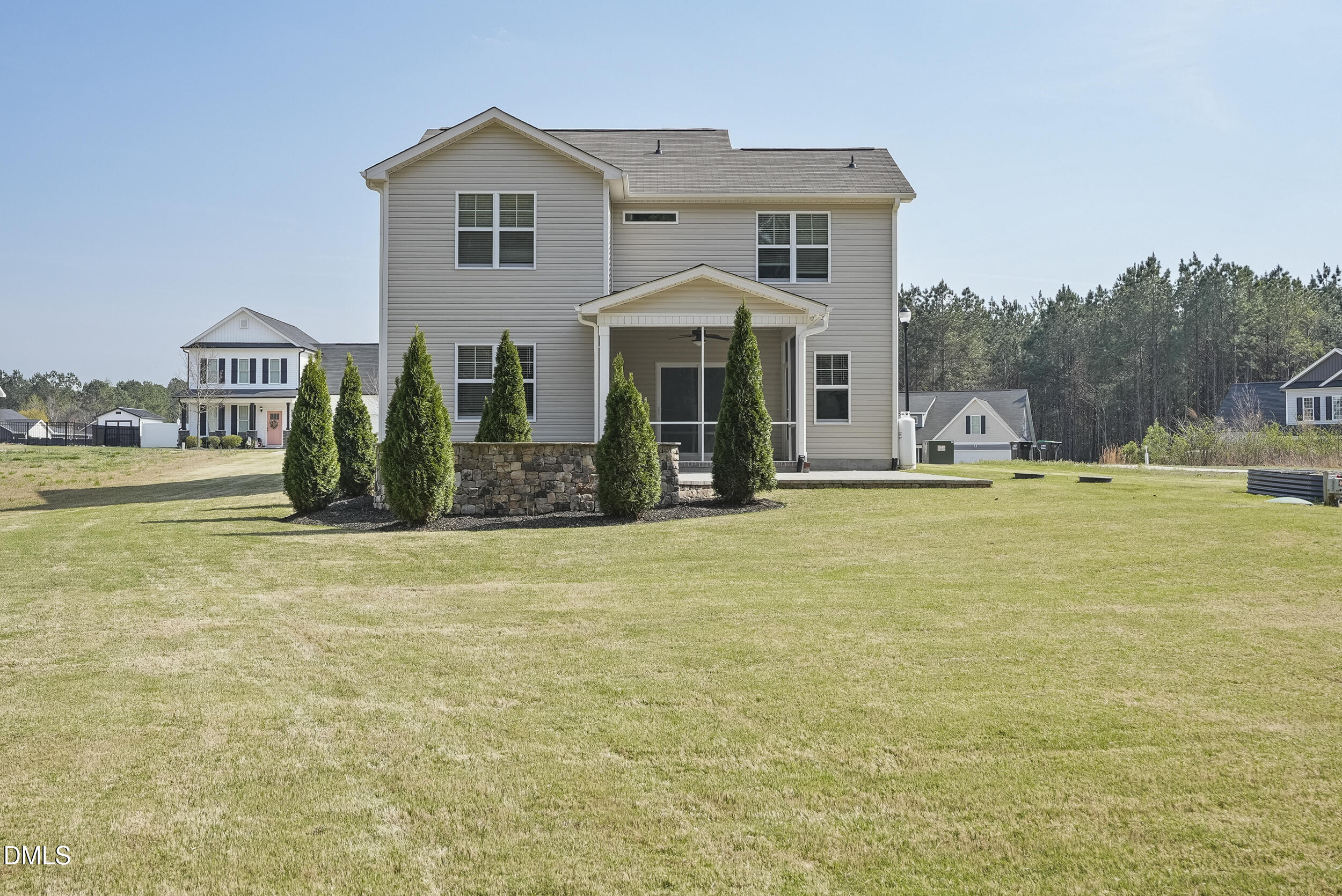 262 Day Lily Street Selma, NC 27576 - Photo 33 of 39 a front view of a house with garden