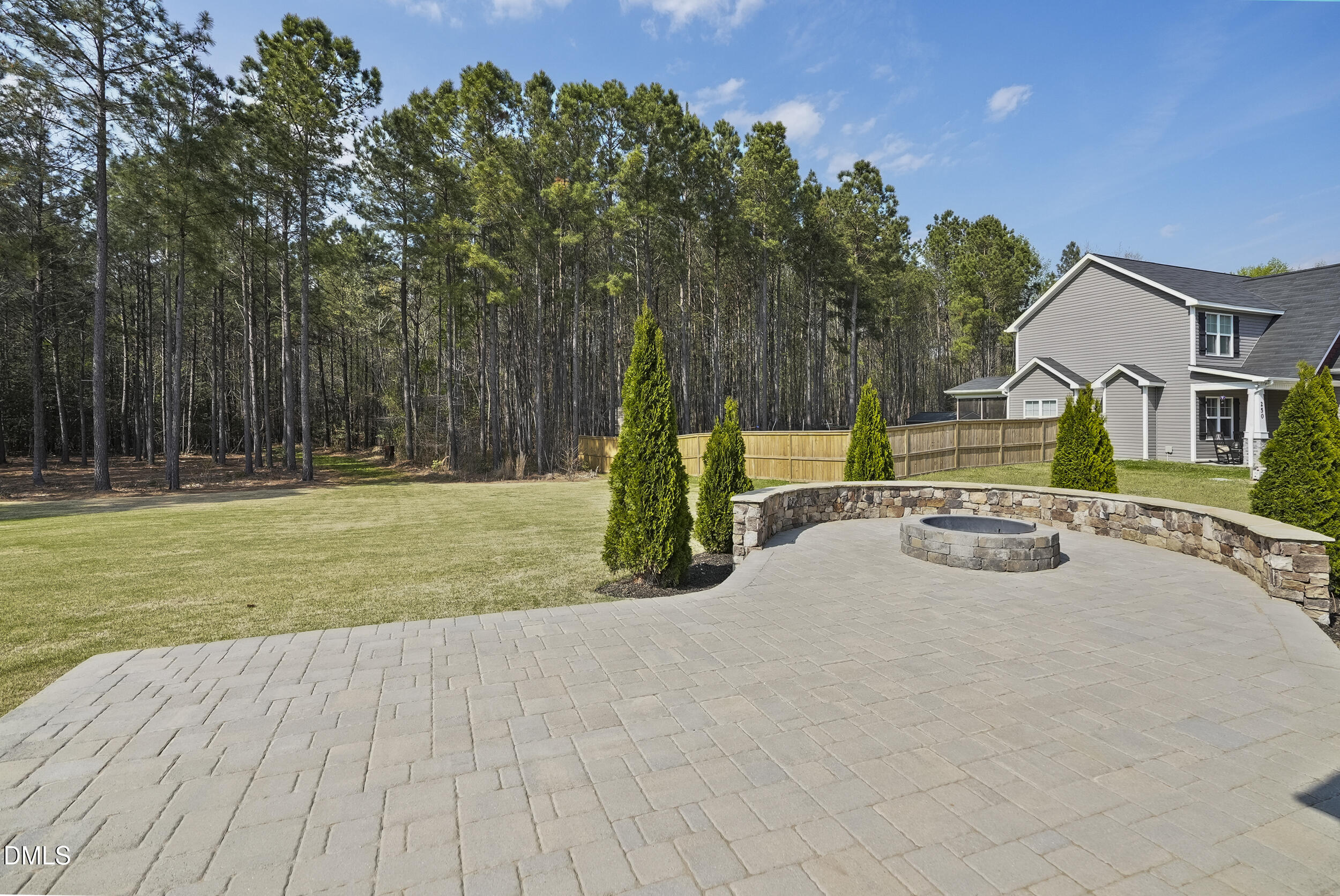 262 Day Lily Street Selma, NC 27576 - Photo 34 of 39 a view of outdoor space with garden and trees