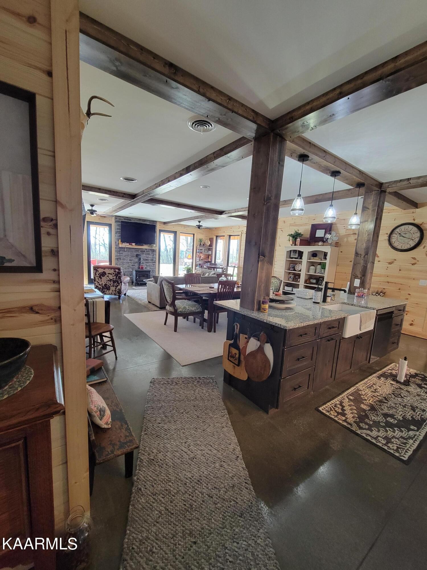 4740 Owl Hole Gap Road Rutledge, TN 37861 - Photo 38 of 58 a living room with patio furniture and a fireplace
