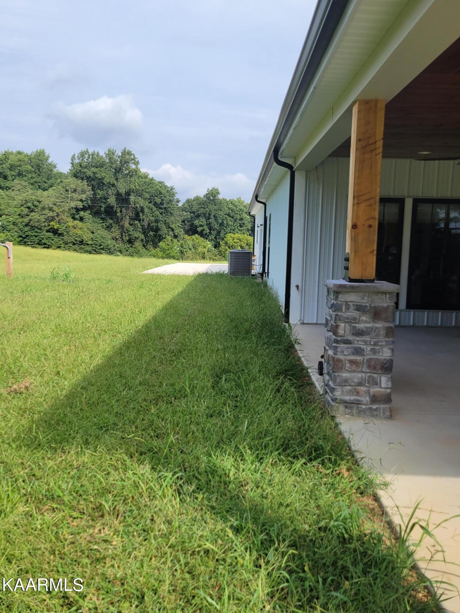 4740 Owl Hole Gap Road Rutledge, TN 37861 - Photo 4 of 58 a view of a house with a yard