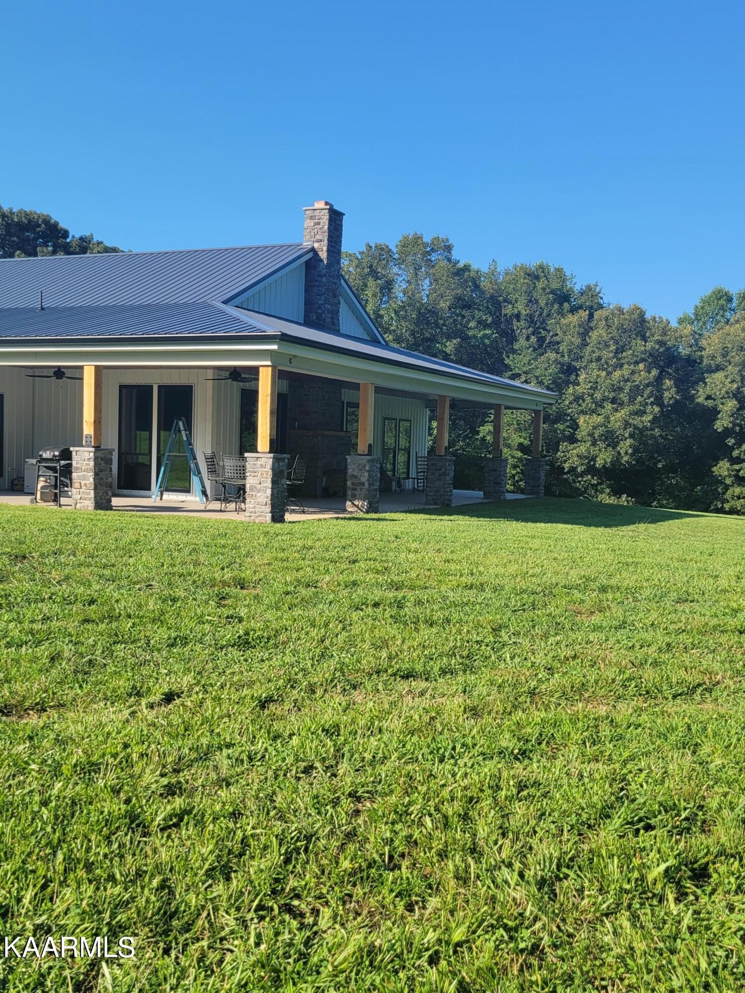 4740 Owl Hole Gap Road Rutledge, TN 37861 - Photo 7 of 58 a view of a house with a yard