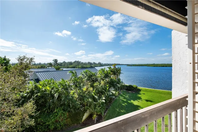a view of a garden from a balcony