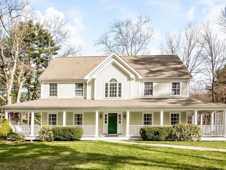 206 Chestnut Ridge Road Bethel, CT 06801 - Photo 1 of 1 a front view of a house with a garden