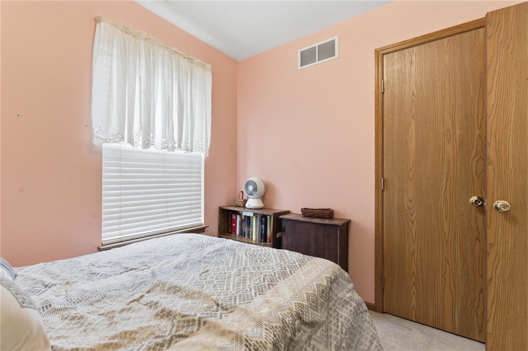 8747 Waynes Way Blanchester, OH 45107 - Photo 14 of 40 This cozy room offers natural light and ample storage, perfect for peaceful repose.