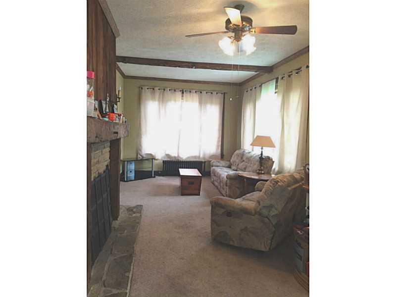 321 Thompson Run Road Pittsburgh, PA 15237 - Photo 11 of 24 Den/Family/Great Room. Walls of windows lightens the family room with a 2 sided gas fireplace