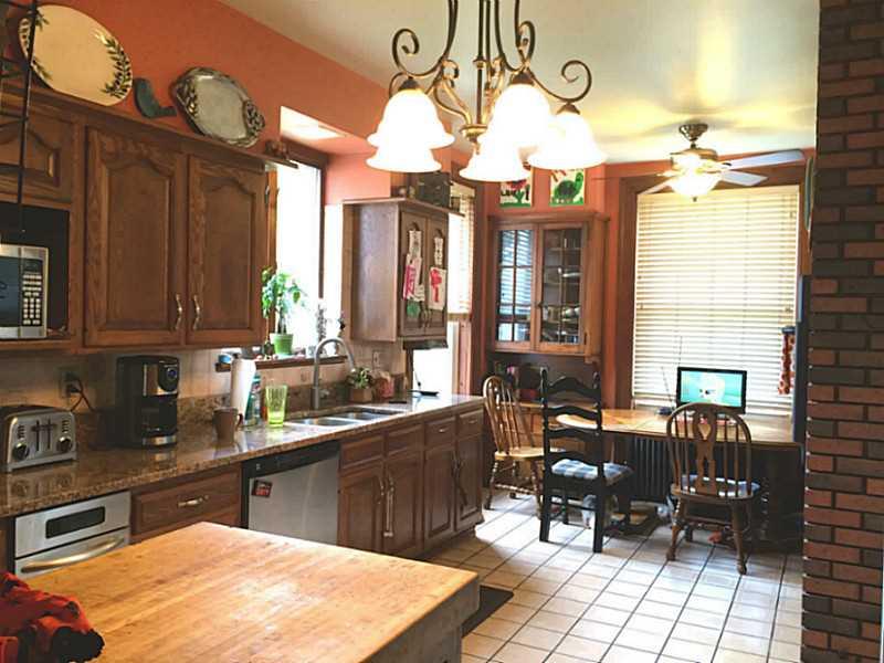 Kitchen. Built in china cabinets, pantry and plenty of cabinet space makes this kitchen a joy to cook in.