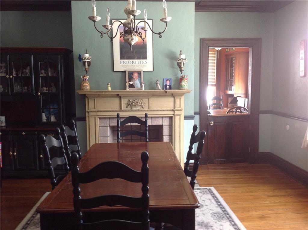 Dining Room: Plenty of space to entertain the family for all the holidays meals. The dining room has a decorative fireplace that over looks to your front yard.