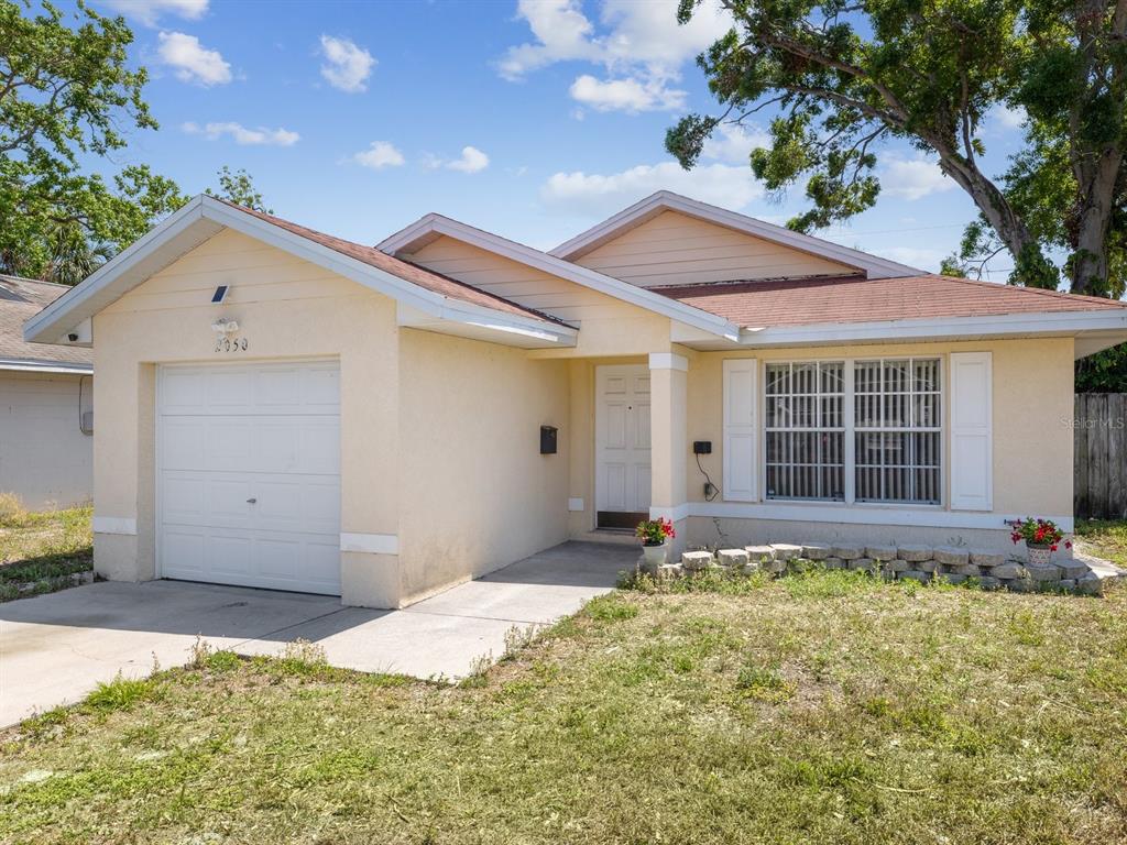 2050 28th Avenue North St. Petersburg, FL 33713 - Photo 1 of 1 a front view of a house with a yard