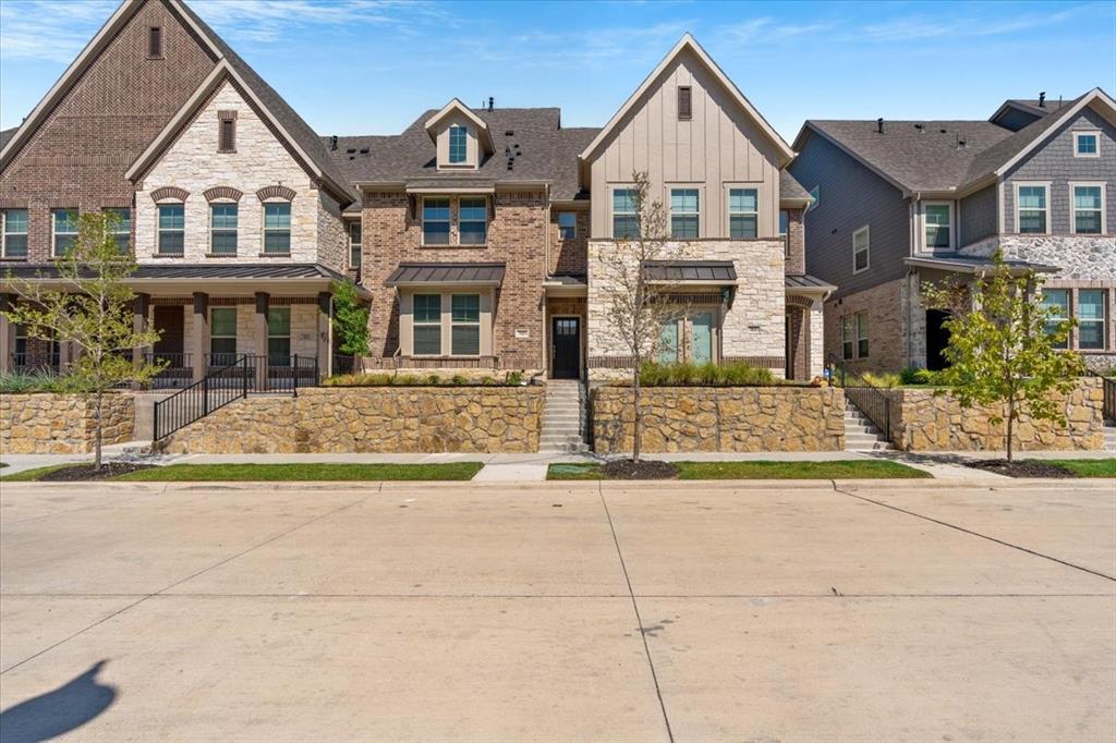 front view of a house with a street