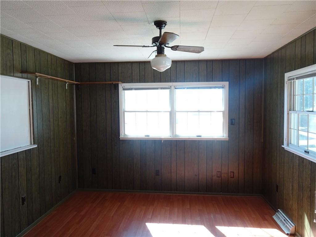 227 South 6th Street Youngwood, PA 15697 - Photo 13 of 27 a view of an empty room with wooden floor and a window