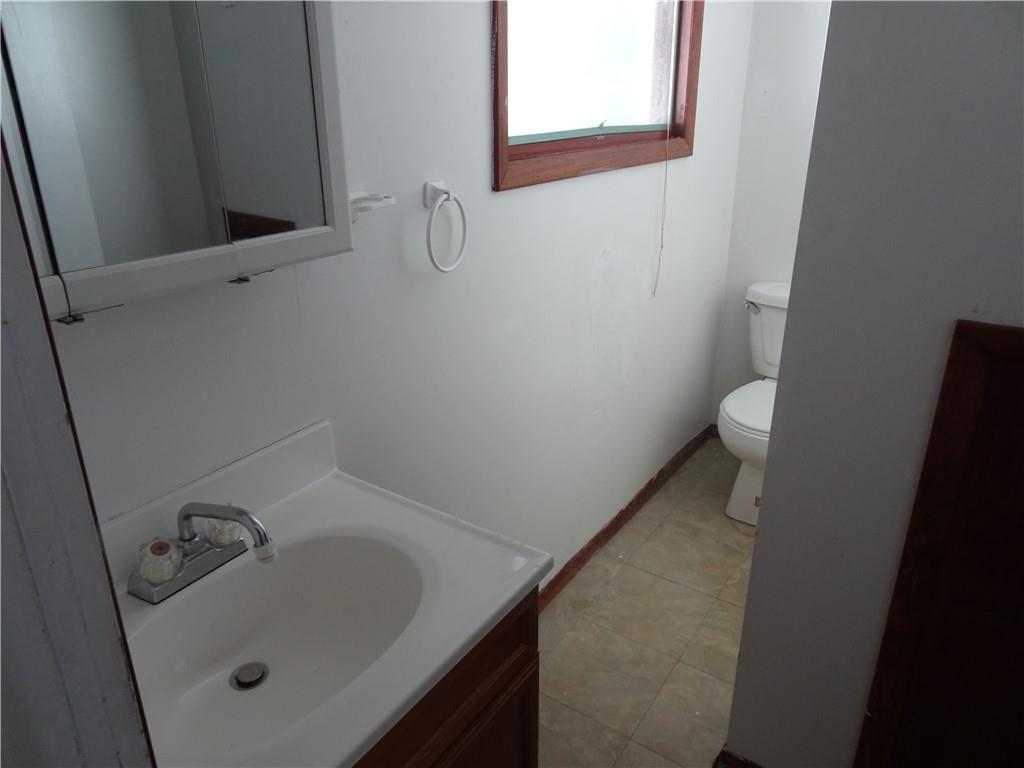 227 South 6th Street Youngwood, PA 15697 - Photo 18 of 27 a bathroom with a sink and toilet