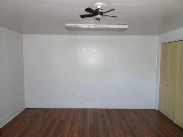 a view of entryway with wooden floor