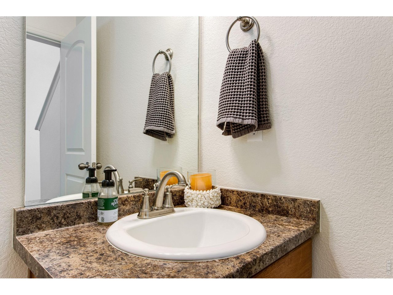 2671 Doe Rdg Way Johnstown, CO 80534 - Photo 21 of 37 Main level powder bathroom