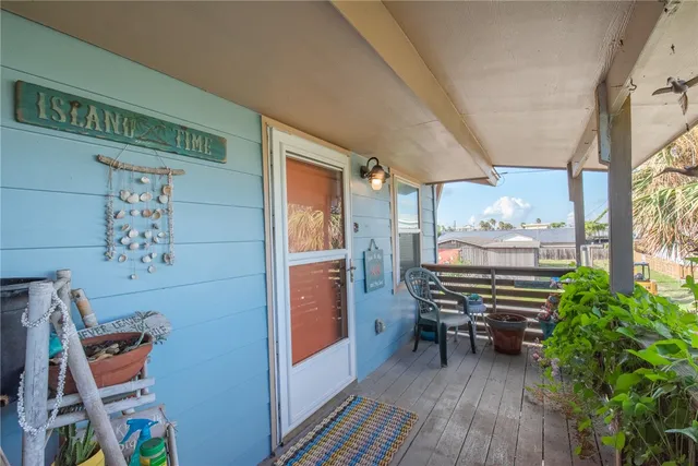 a room with furniture and wooden floor