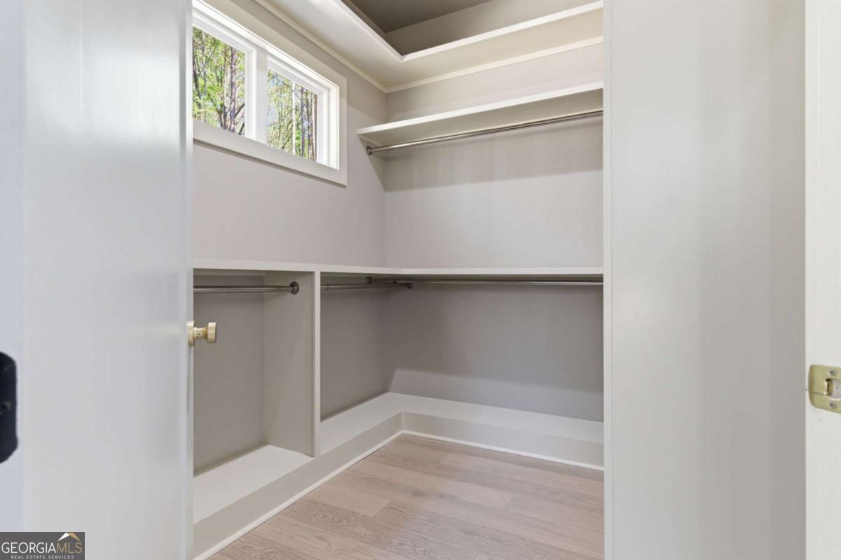 1315 Sandy Creek Road Tyrone, GA 30290 - Photo 80 of 100 a view of an empty walk in closet