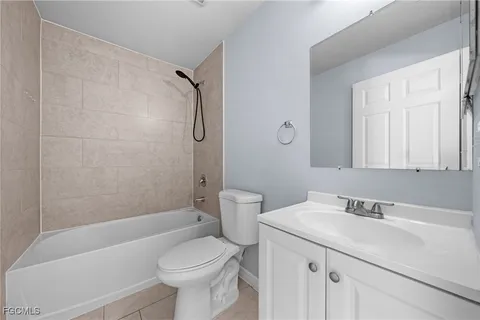 a bathroom with a sink a toilet and a bathtub