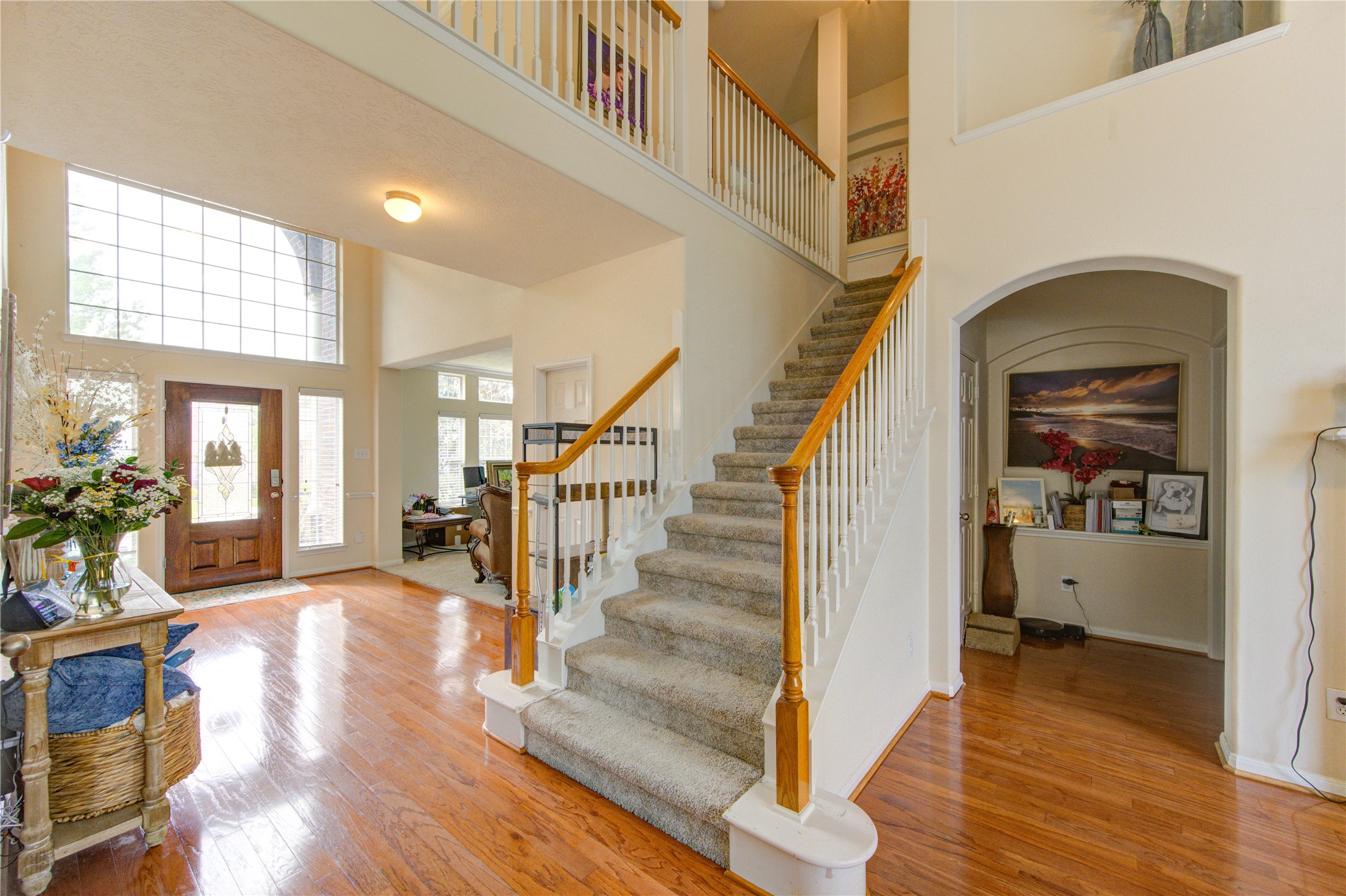 24811 Corbin Gate Drive Spring, TX 77389 - Photo 16 of 32 a view of entryway and hall with wooden floor