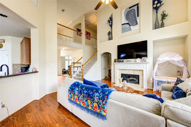 a view of a patio with a table and chairs and potted plants