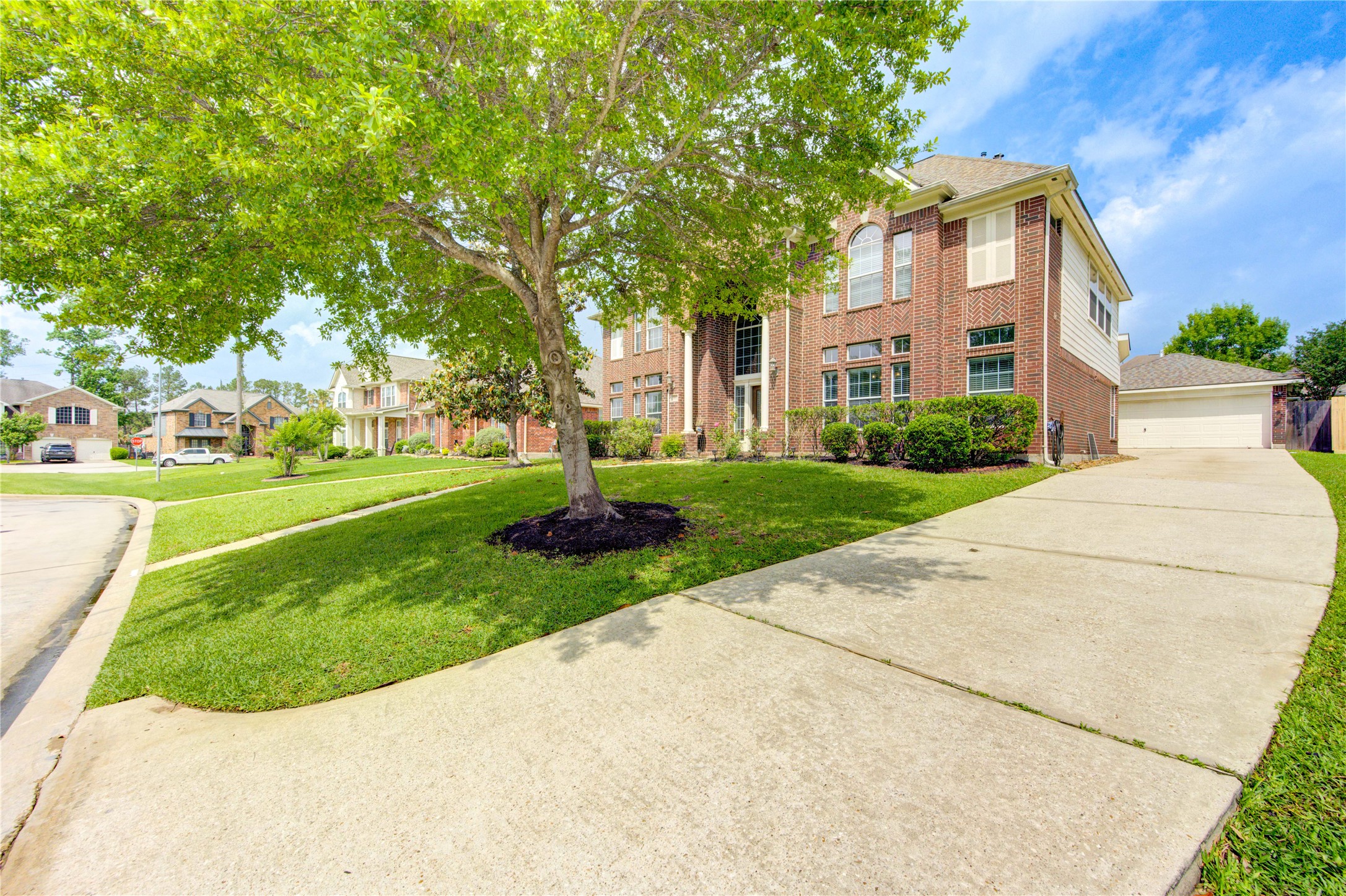 24811 Corbin Gate Drive Spring, TX 77389 - Photo 2 of 32 a front view of a house with a yard