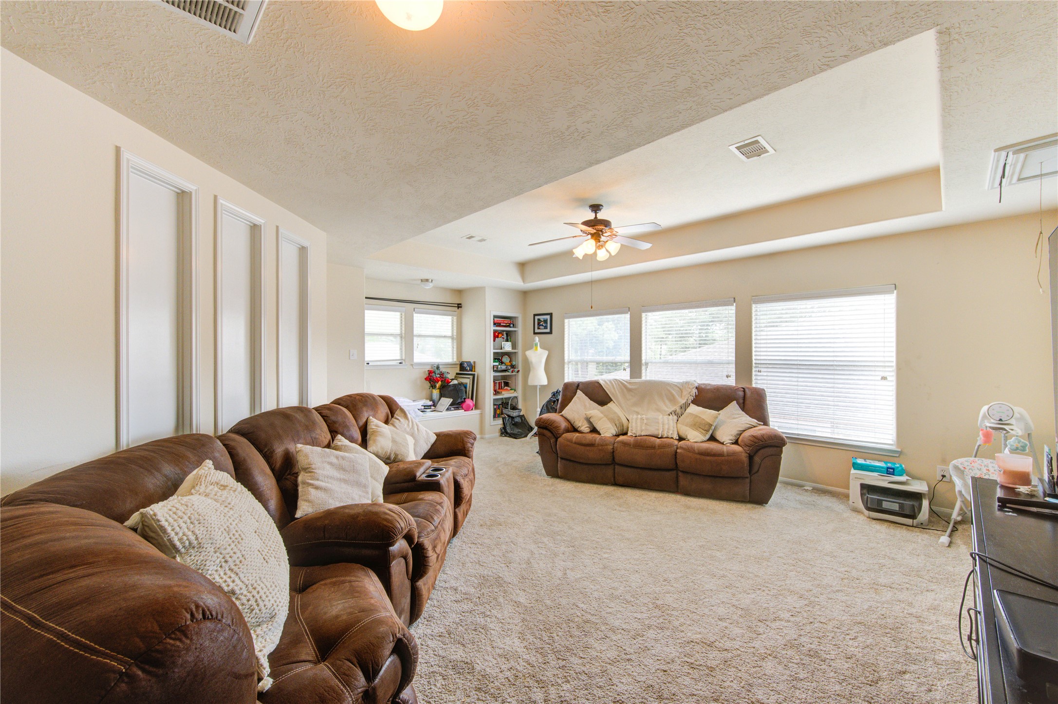 24811 Corbin Gate Drive Spring, TX 77389 - Photo 24 of 32 a living room with furniture and a large window