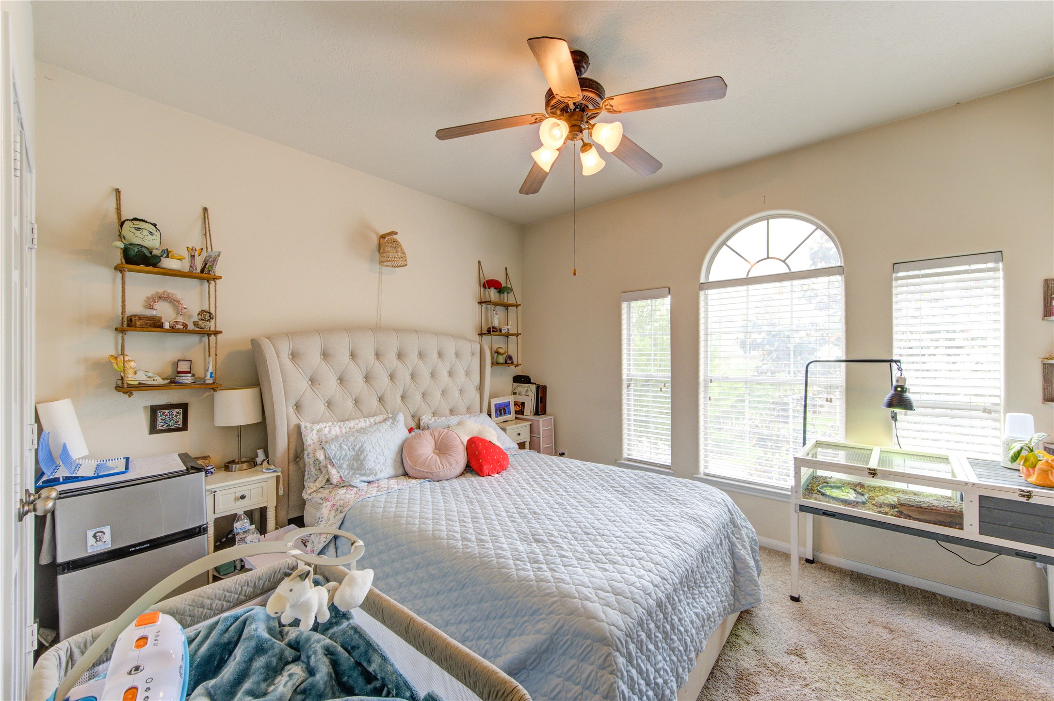 24811 Corbin Gate Drive Spring, TX 77389 - Photo 27 of 32 a bedroom with a bed and a large window