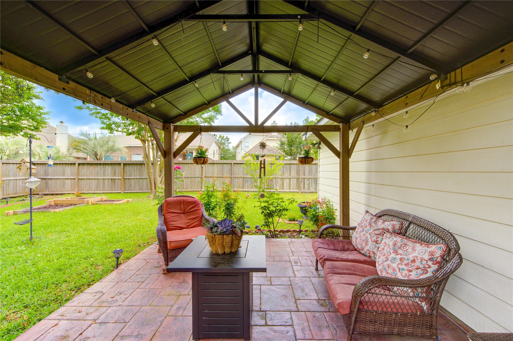 24811 Corbin Gate Drive Spring, TX 77389 - Photo 6 of 32 a garden view with a seating space