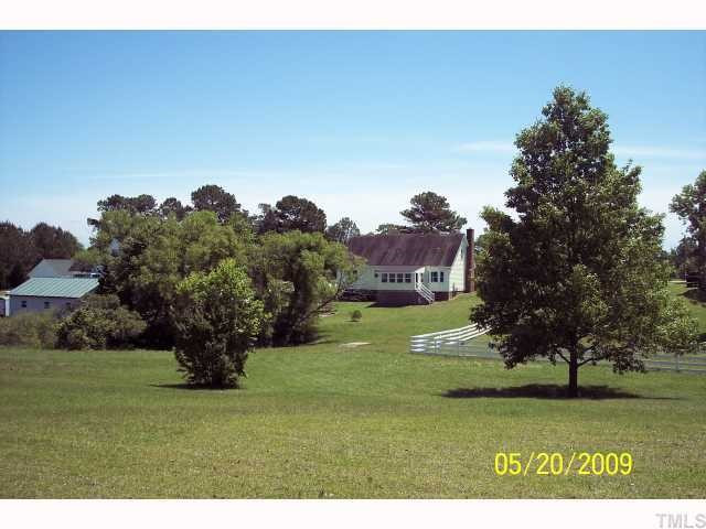 1009 Lake Path Road Willow Spring, NC 27592 - Photo 11 of 12 View from back of lot towards the house