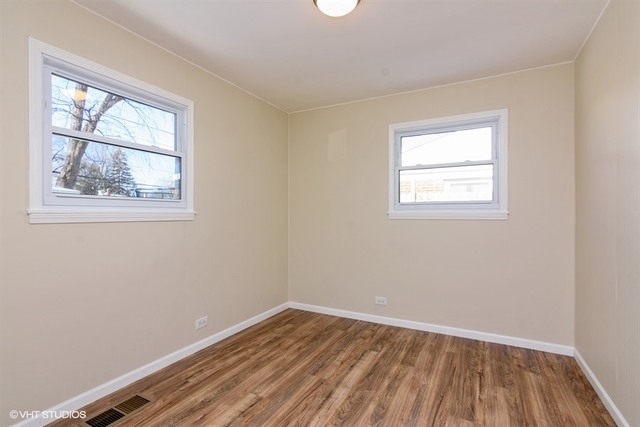 170 George Road Wheeling, IL 60090 - Photo 8 of 11 an empty room with a window
