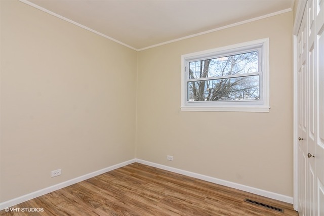 170 George Road Wheeling, IL 60090 - Photo 9 of 11 an empty room with windows