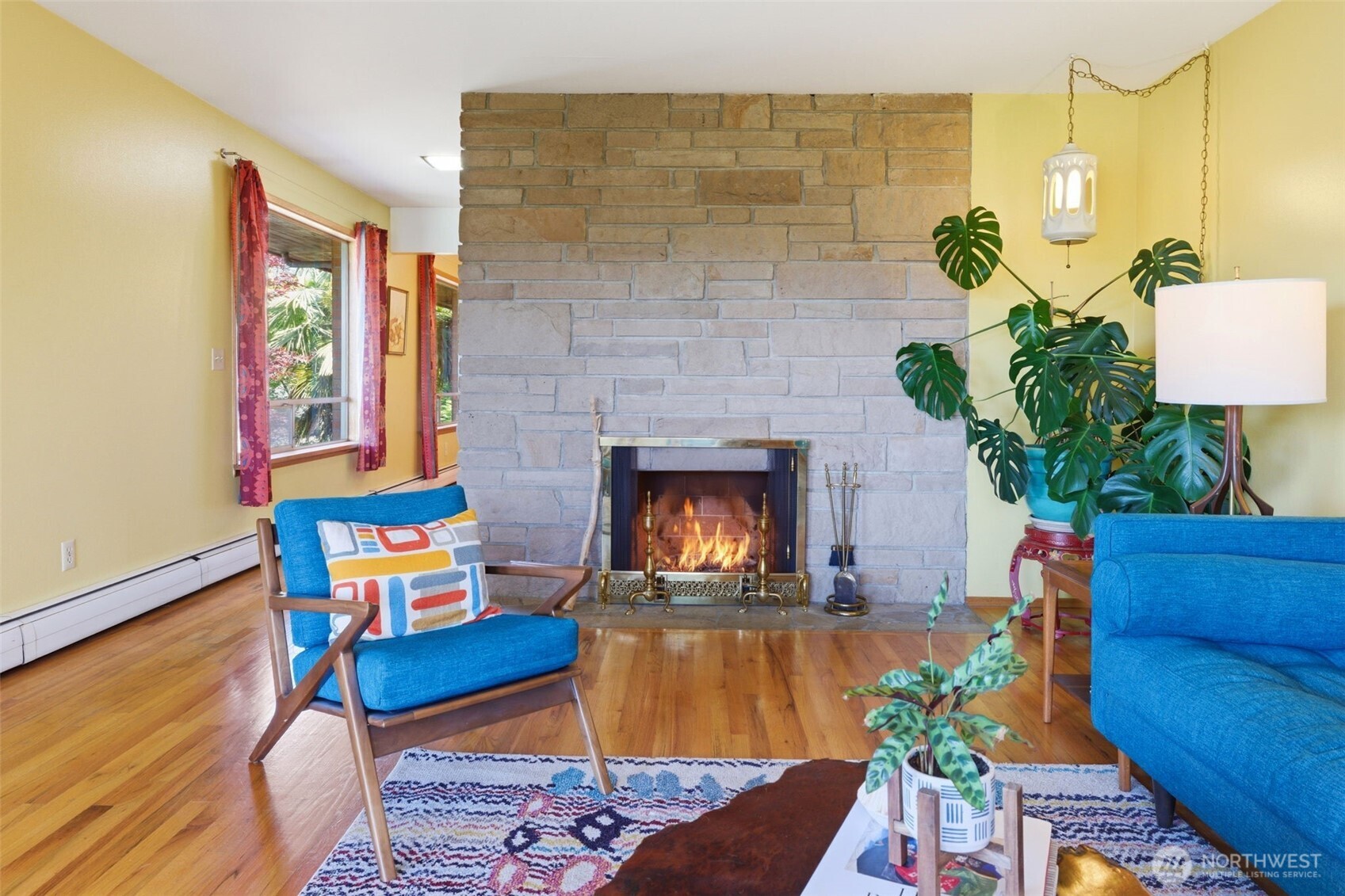 2803 South Walker Street Seattle, WA 98144 - Photo 20 of 40 a living room with furniture and a fireplace
