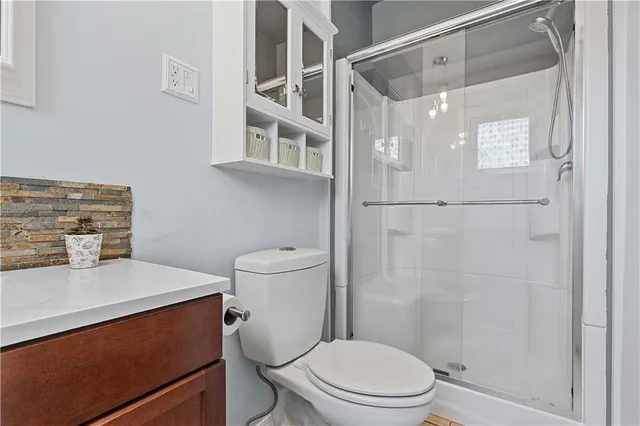 a view of storage and utility room with washer and dryer