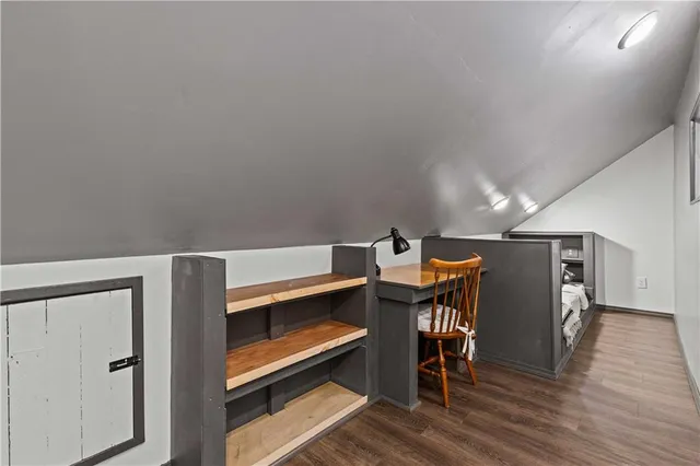 a livingroom with furniture and wooden floor