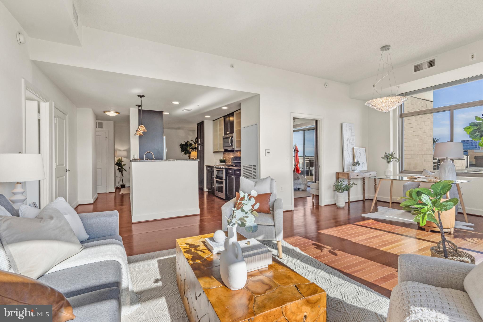 3650 South Glebe Road, Unit 1050 Arlington, VA 22202 - Photo 15 of 47 a living room with furniture and wooden floor