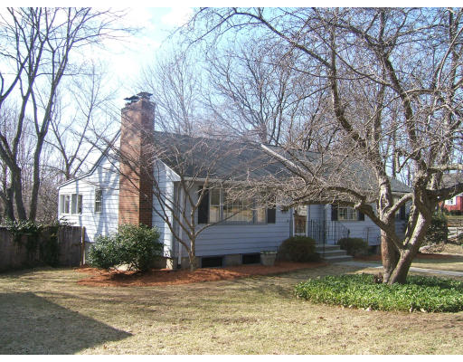 1 Frances Road Lexington, MA 02421 - Photo 2 of 10 a wooden building with trees in front of it