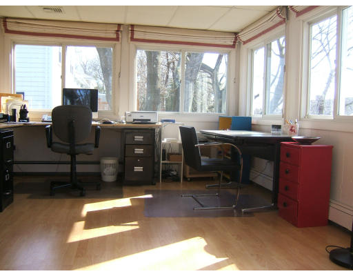 1 Frances Road Lexington, MA 02421 - Photo 7 of 10 a view of a workspace with furniture and a window