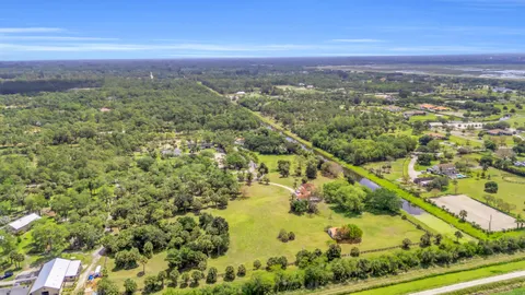 a view of a city with an ocean