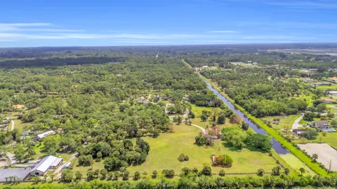 a view of a lake with a city