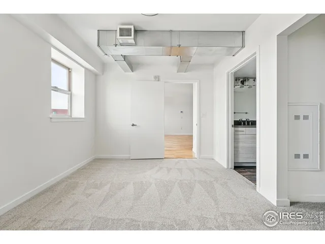 a view of a room with racks on the wall