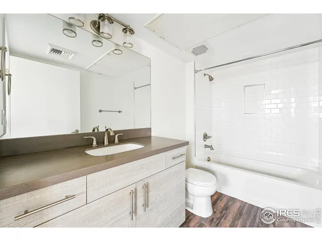a view of bathroom with dual sinks