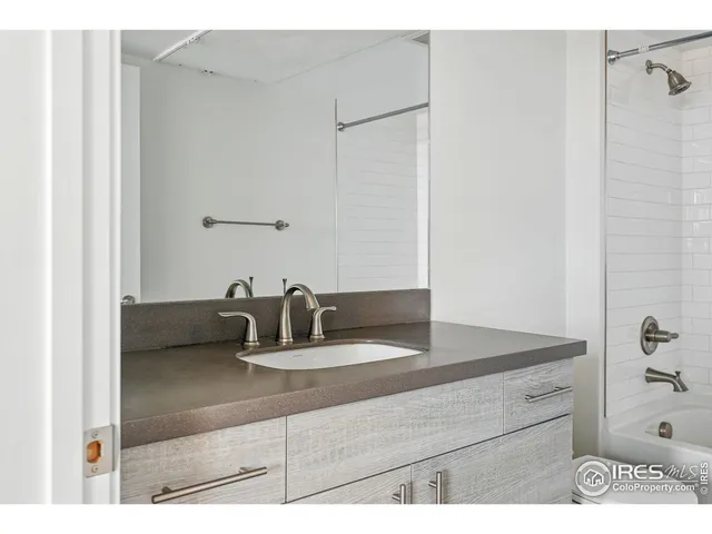 a view of a room with furniture and a potted plant