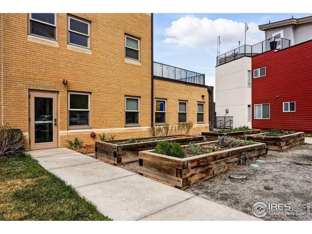 a swimming pool with outdoor seating