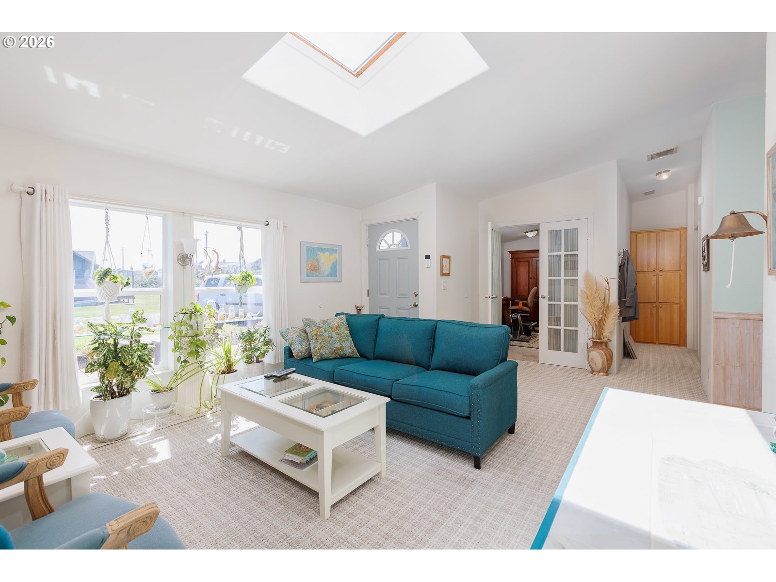 2018 Northwest Oceanic Loop Waldport, OR 97394 - Photo 4 of 35 a living room with furniture and a large window