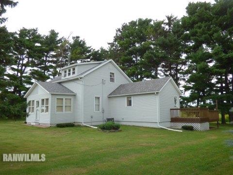 15476 West Nora Road Winslow, IL 61089 - Photo 18 of 23 a view of a house with a yard