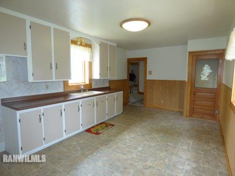 15476 West Nora Road Winslow, IL 61089 - Photo 2 of 23 a large white kitchen with a sink