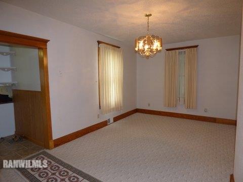 15476 West Nora Road Winslow, IL 61089 - Photo 5 of 23 a view of an empty room with a window