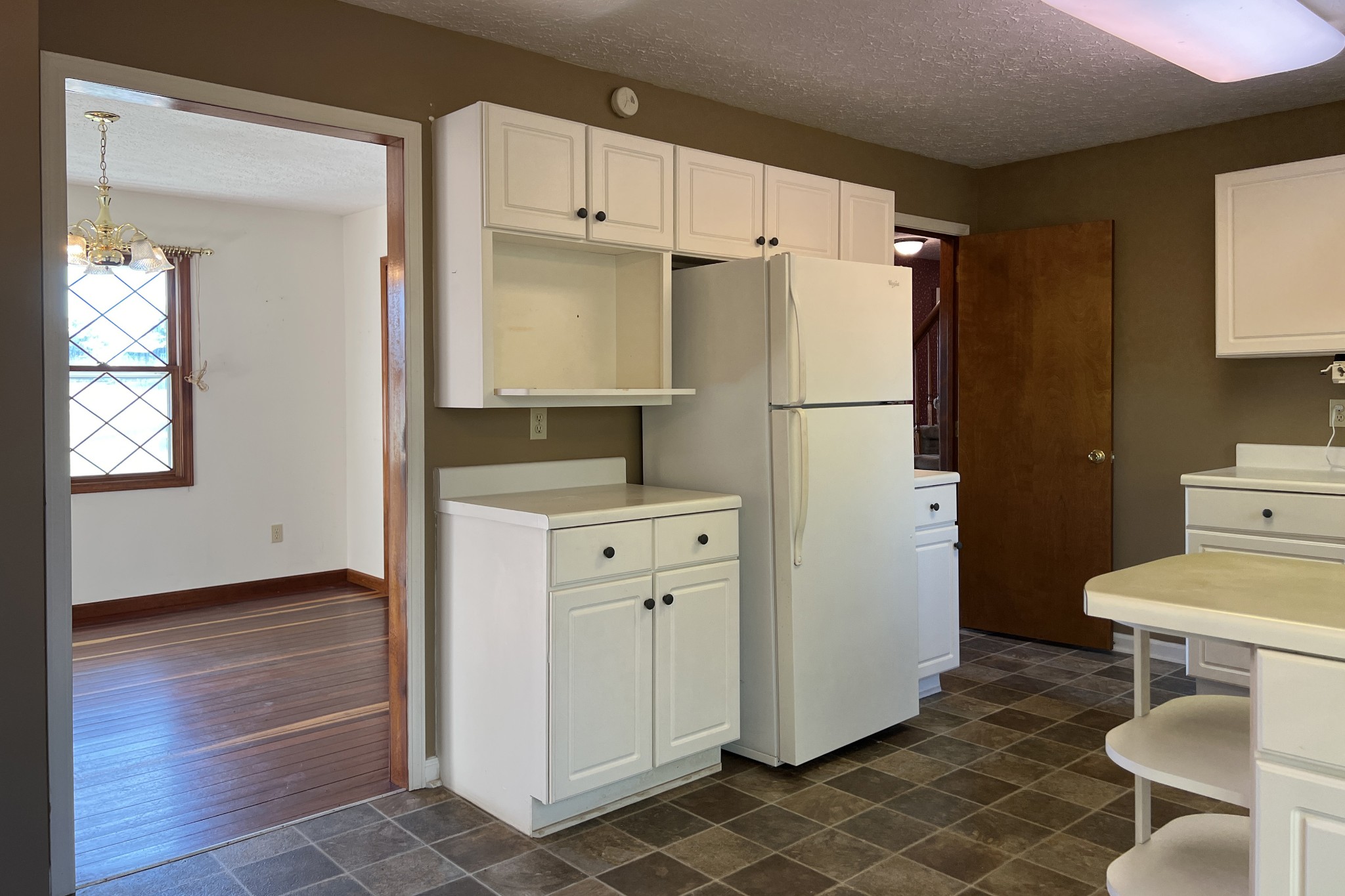 1015 Salem Road Franklin, KY 42134 - Photo 11 of 61 a white refrigerator freezer sitting inside of a kitchen