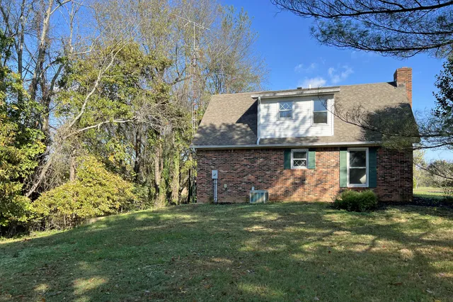 a view of a lake with a yard