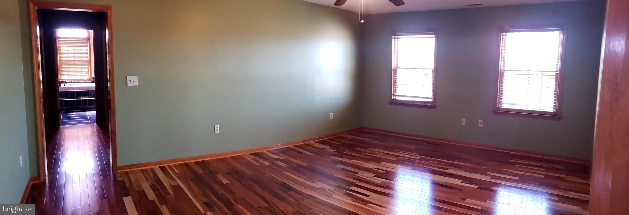 2031 Peters Corner Road Marydel, MD 21649 - Photo 21 of 45 master bedroom with tiger cherry floor