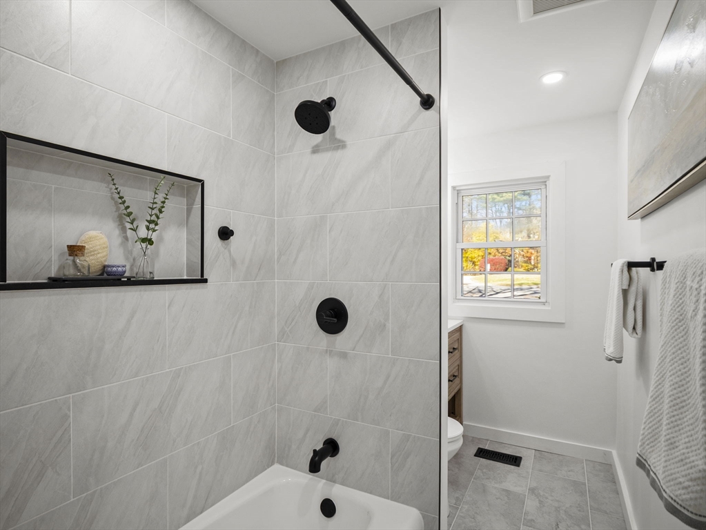 9 Elm Street, Unit 1 Acton, MA 01720 - Photo 17 of 29 a bathroom with a shower