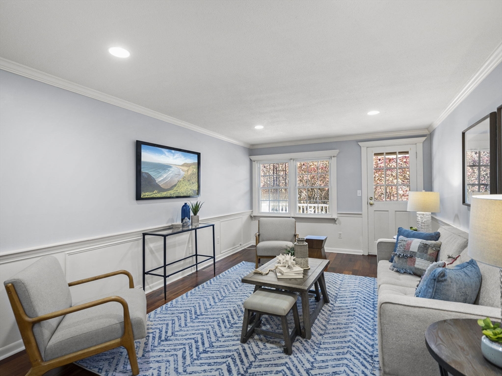 9 Elm Street, Unit 1 Acton, MA 01720 - Photo 2 of 29 a living room with furniture and a window